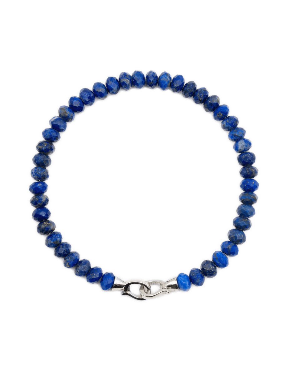 Elegant Lapis Lazuli bracelet with 4x6mm faceted beads and a sterling silver clasp, perfect for spiritual journeys.