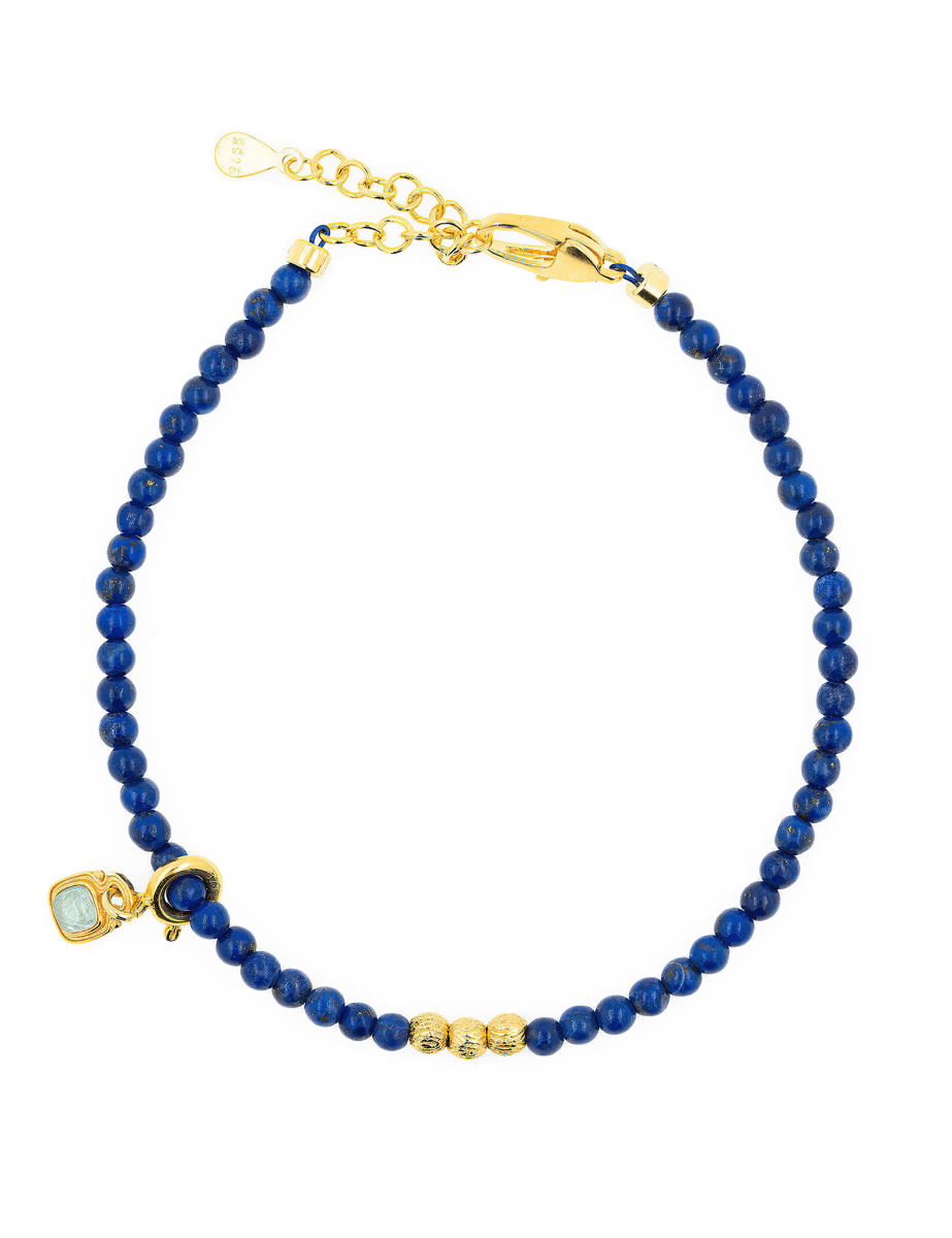 Lapis Lazuli dainty bracelet with silver spacer bead and tourmaline charm, perfect for spiritual insight and protection.