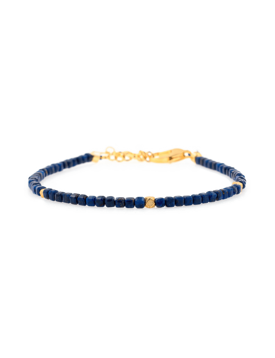 Lapis Lazuli faceted bracelet with silver spacer bead, promoting wisdom and clarity for spiritual growth.