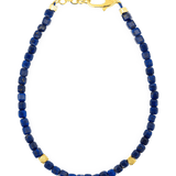 Spirituality Lapis Lazuli faceted bracelet with gold clasp and spacer beads, promoting clarity and intuition.