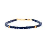 Lapis Lazuli faceted bracelet with silver spacer beads showcasing wisdom and elegance.