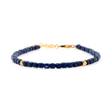 Lapis Lazuli faceted bracelet with silver spacer beads showcasing wisdom and elegance.