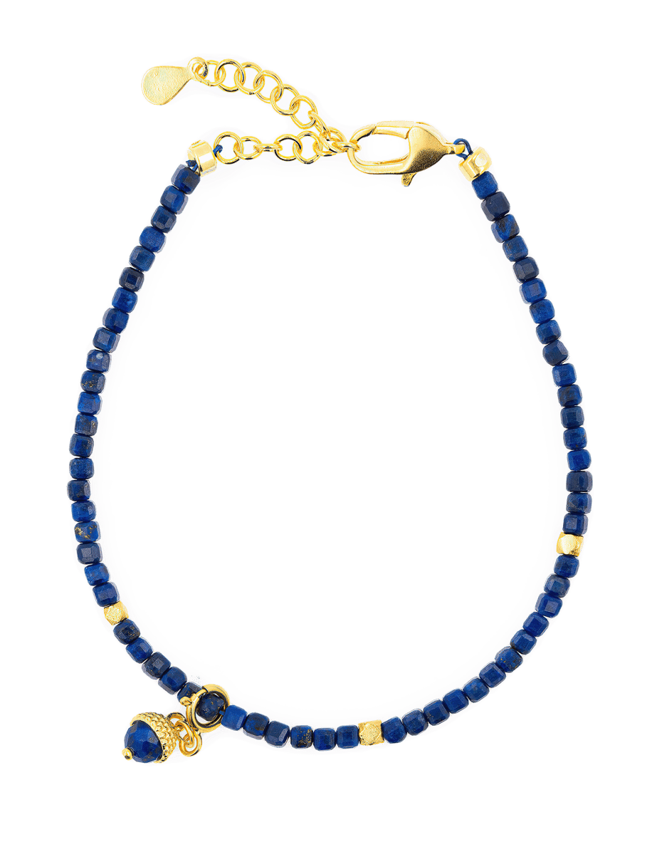 Spirituality Lapis Lazuli bracelet with gold accents and charm for inner wisdom and self-expression.