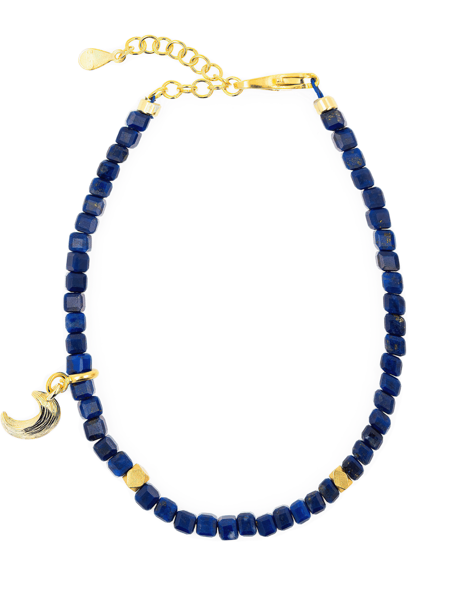 Lapis Lazuli faceted bracelet with silver spacer bead and moon charm, symbolizing intuition and transformation.