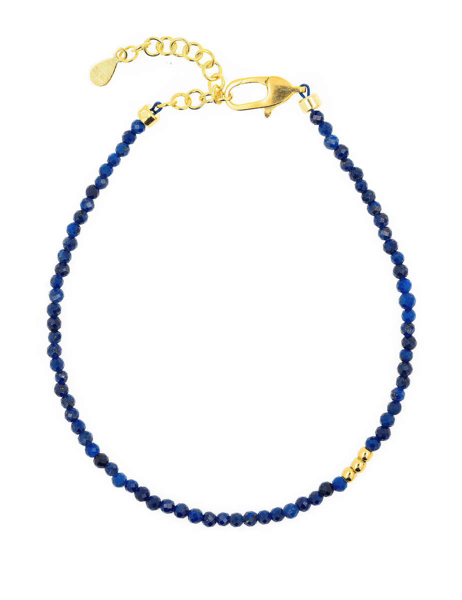 Lapis Lazuli faceted dainty bracelet with gold clasp and chain for adjustable fit, promoting wisdom and clarity.