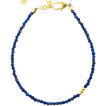 Lapis Lazuli faceted dainty bracelet with gold clasp and chain for adjustable fit, promoting wisdom and clarity.