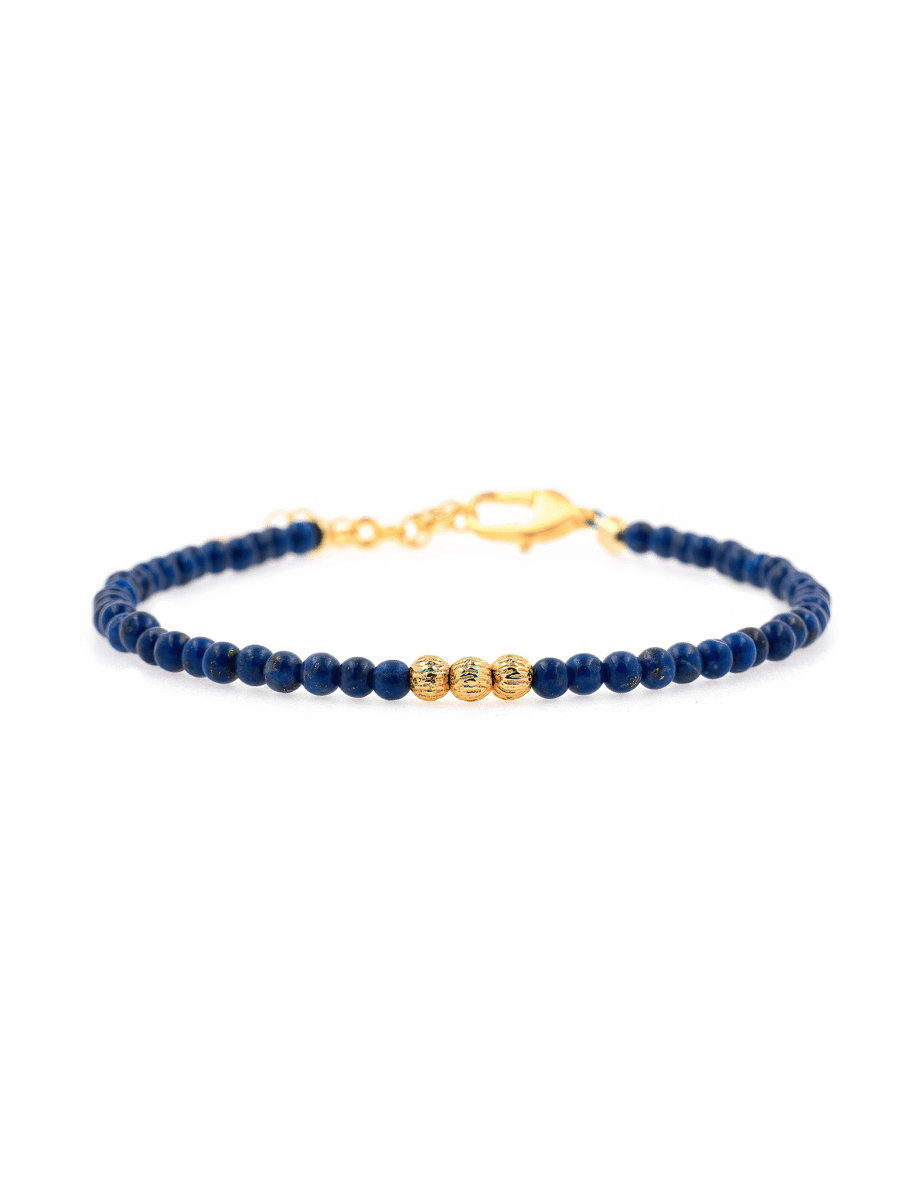 Lapis Lazuli beaded bracelet with gold spacer beads, symbolizing wisdom and intuition.