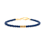 Lapis Lazuli beaded bracelet with gold spacer beads, symbolizing wisdom and intuition.