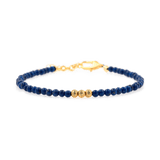 Lapis Lazuli beaded bracelet with gold spacer beads, symbolizing wisdom and intuition.