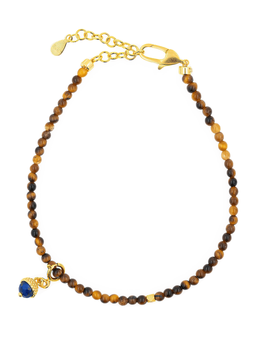 Dainty Yellow Tiger’s Eye bracelet with Lapis Lazuli charm and silver spacer bead, perfect for confidence and wisdom.