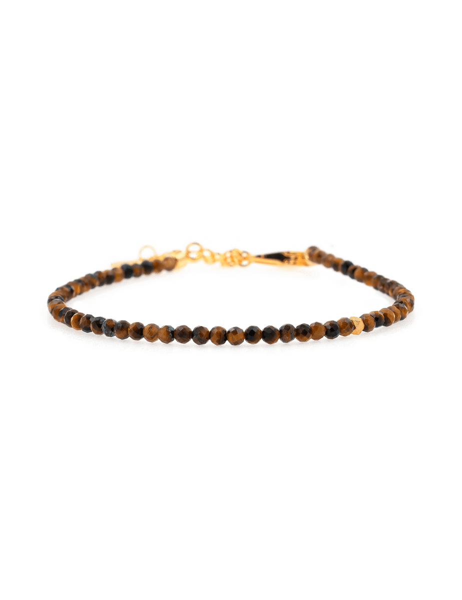Faceted Yellow Tiger’s Eye bracelet with 2mm silver spacer beads, symbolizing confidence and motivation.