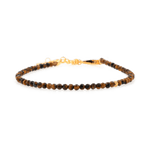 Faceted Yellow Tiger’s Eye bracelet with 2mm silver spacer beads, symbolizing confidence and motivation.