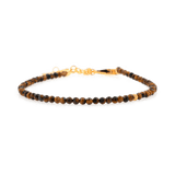 Faceted Yellow Tiger’s Eye bracelet with 2mm silver spacer beads, symbolizing confidence and motivation.