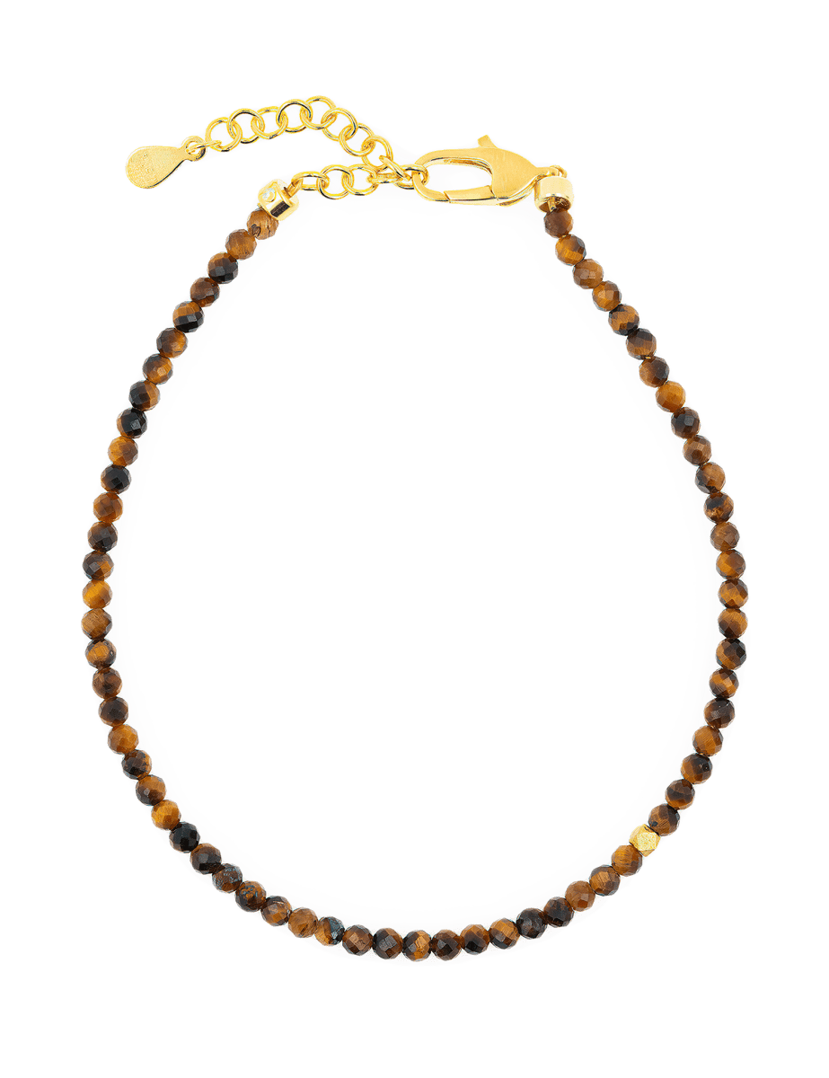 Dainty faceted Yellow Tiger’s Eye bracelet with gold clasp and spacer beads for confidence and motivation.