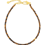 Dainty faceted Yellow Tiger’s Eye bracelet with gold clasp and spacer beads for confidence and motivation.