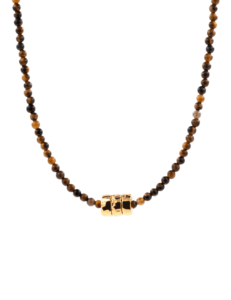 Dainty tiger's eye necklace with gold-plated nuggets, showcasing earthy tones and artisanal design.