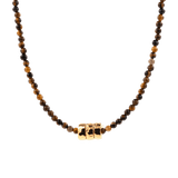 Dainty tiger's eye necklace with gold-plated nuggets, showcasing earthy tones and artisanal design.