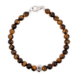 Tiger eye bracelet for men with 6mm beads and sterling silver zodiac spacer, promoting confidence and focus.