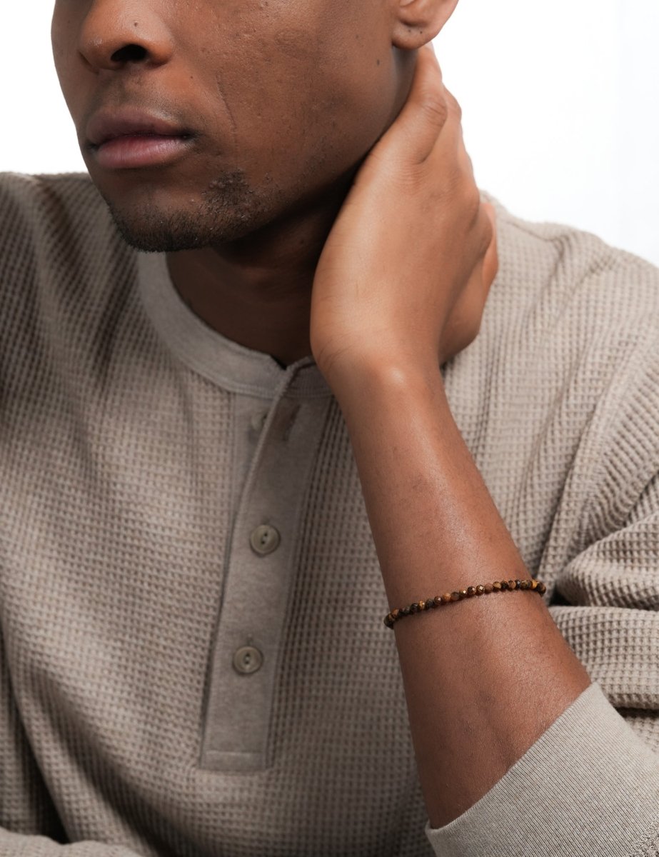 Model wearing BEAMMORE tiger’s eye faceted 4mm bracelet – Clean, modern style