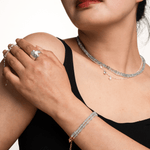 Model showcasing Water Flow Essence Aquamarine bracelet alongside elegant jewelry in minimalist style.