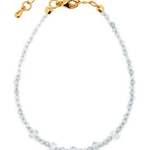 Mirage Vein Aquamarine Dainty Bracelet with gold clasp, showcasing delicate beads inspired by ocean waves.
