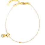 Wealth Citrine faceted dainty bracelet with tourmaline charm on a stylish background.