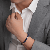 Man wearing a Lapis Lazuli and gold-plated sterling silver bracelet, enhancing style and elegance.
