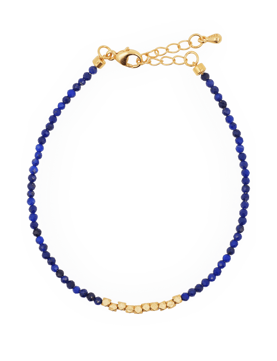 Lapis Lazuli bracelet with gold spacer beads, symbolizing communication and spiritual awareness.