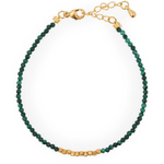 Wood malachite bracelet with gold spacer beads for personal growth and emotional healing.