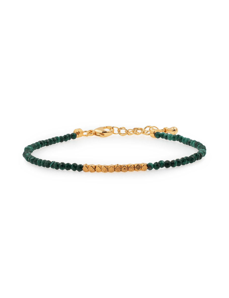 Wood malachite bracelet with gold spacer beads, symbolizing personal growth and emotional healing.