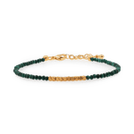 Wood malachite bracelet with gold spacer beads, symbolizing personal growth and emotional healing.