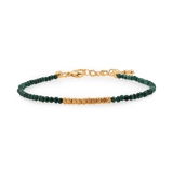 Wood malachite bracelet with gold spacer beads, symbolizing personal growth and emotional healing.